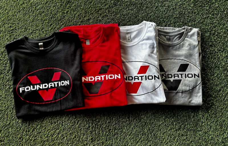 foundation v shirts in all colors of black, red, white, and grey. This shirt is an athletic fit shirt to fit  gym standards and the street. Redefine the essence of working out your gym wardrobe is bult up of both cotton and polyester.